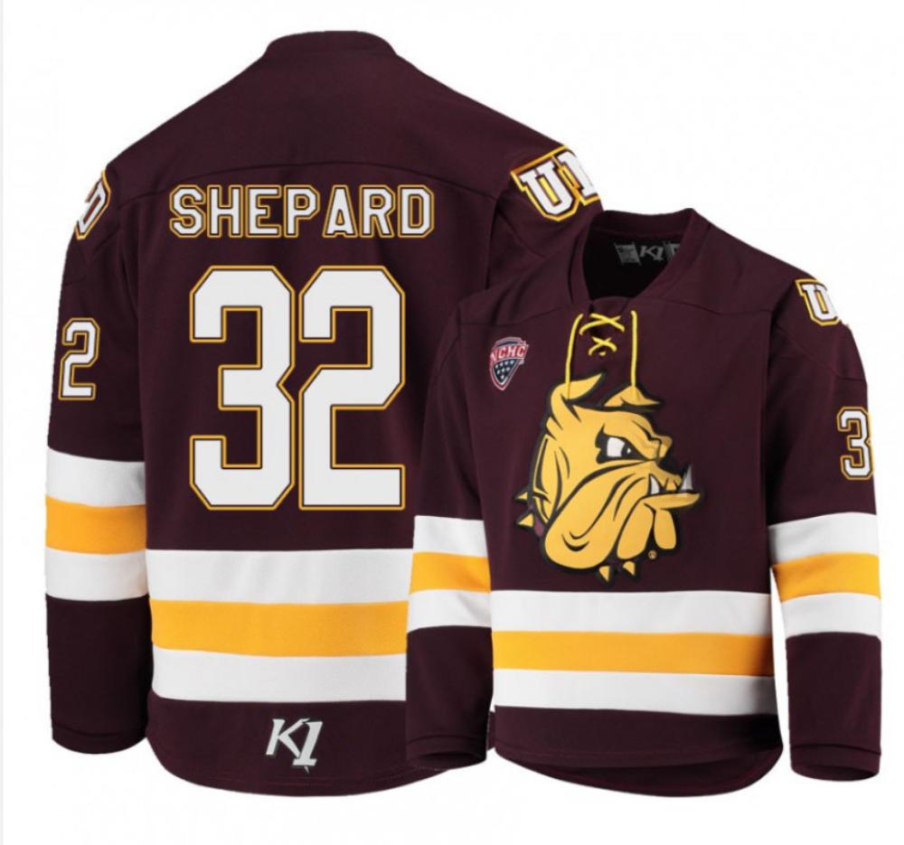 Mens Minnesota Duluth Bulldogs 32 Hunter Shepard Red Hockey Jersey
